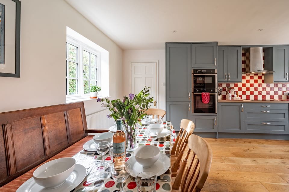 Orchard Cottage, Burnham Thorpe: Breakfast table in kitchen