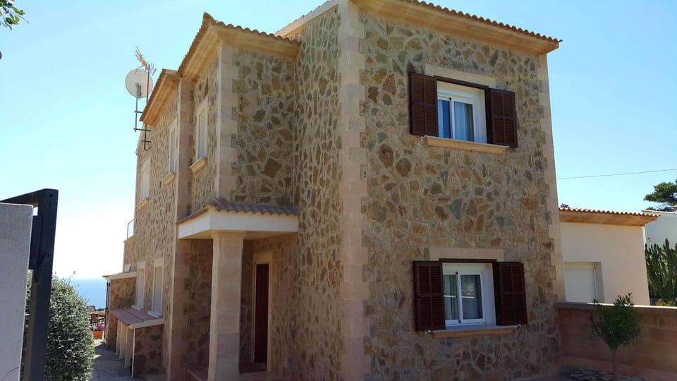 Street view of our 2 story semi-detached property.