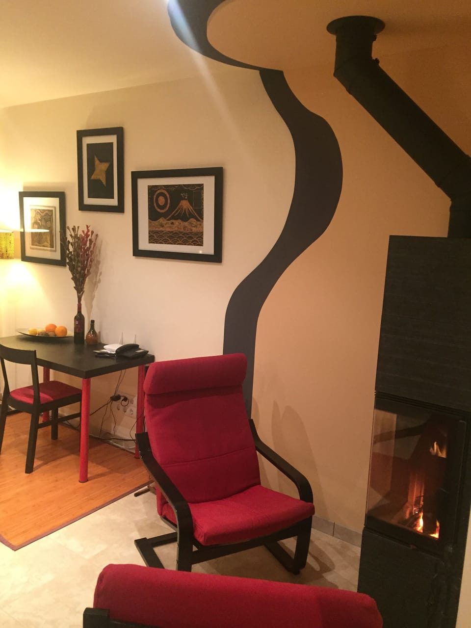 Monolith fireplace and desk area.