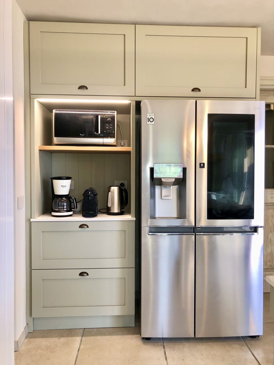 LG fridge, Nespresso machine, microwave, kettle, American coffee maker