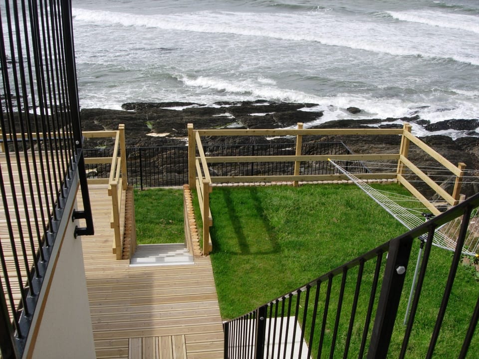View of the  back garden overlooking the beach
