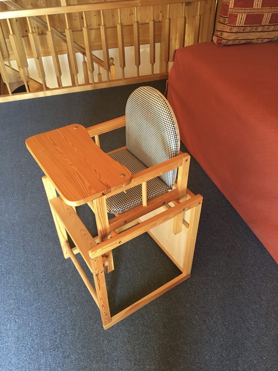 Child's chair stored in upstairs mezzanine area.