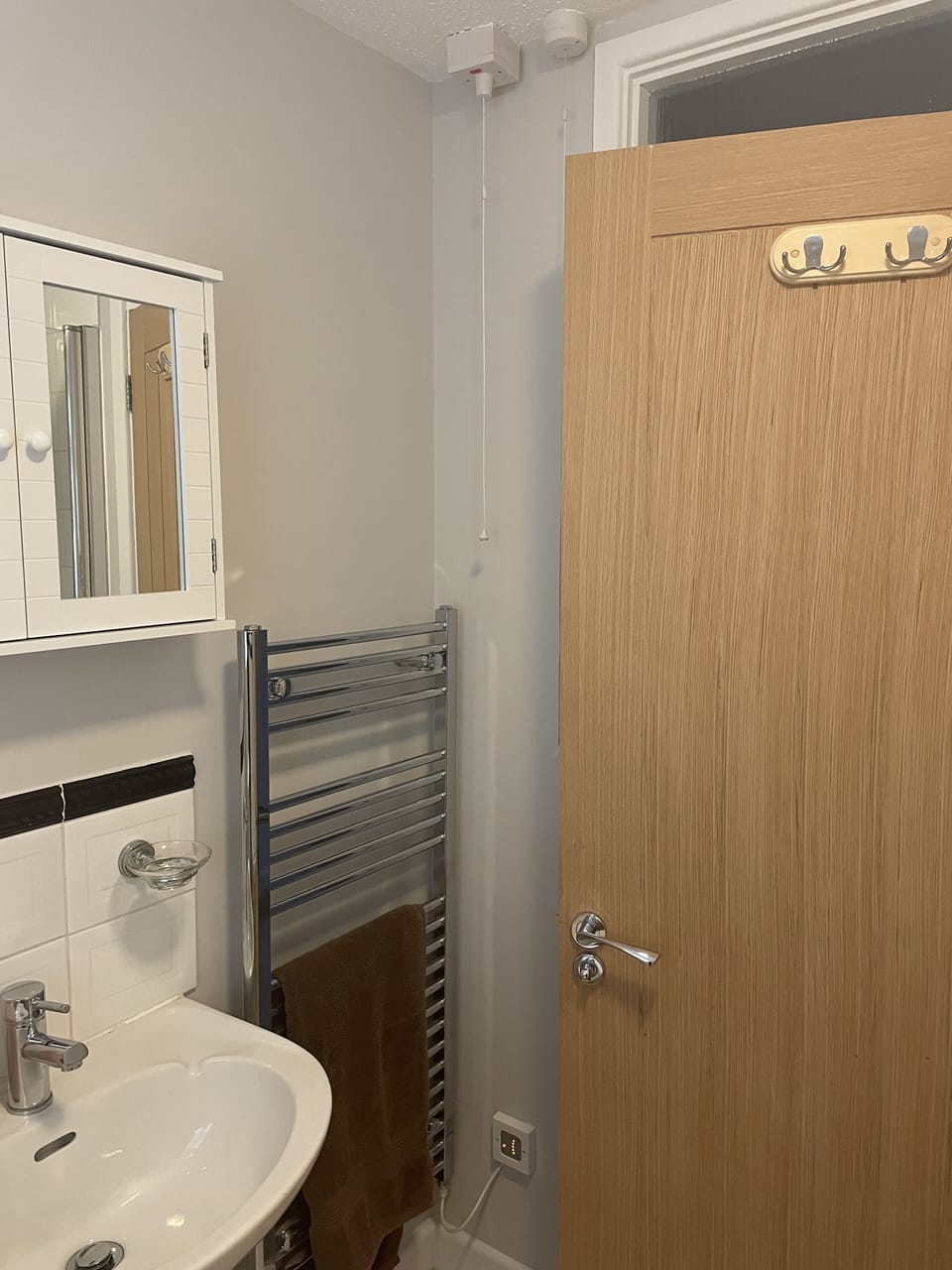Bathroom with heated towel rail