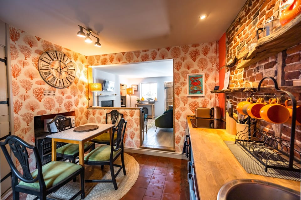 Ground floor: The kitchen has exposed brickwork