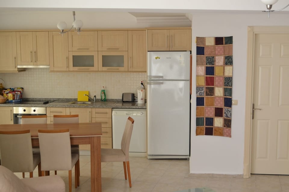 Poseidon 3, fully equipped kitchen and stylish dining area