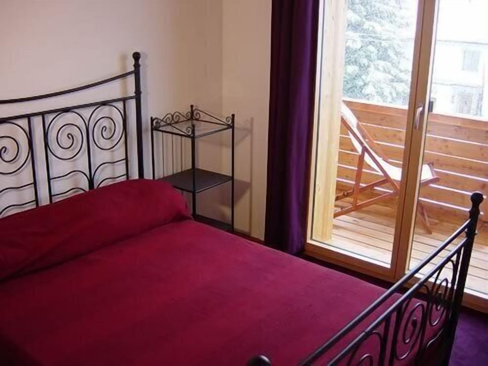 Maple bedroom with balcony