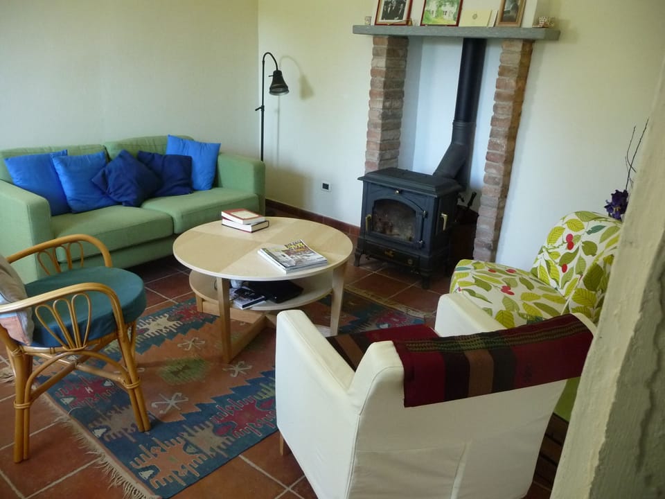 Cosy, comfortable sitting room with wood stove