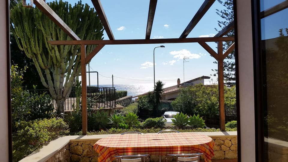 Enjoy the lovely sea view right from the front door and kitchen 
