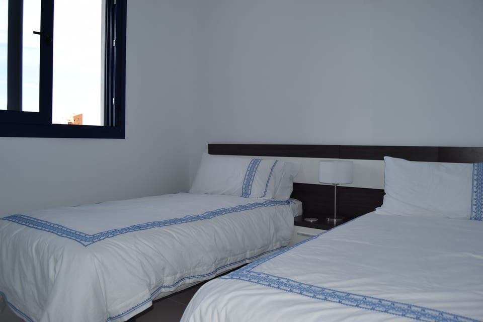 Twin single room with fitted wardrobes