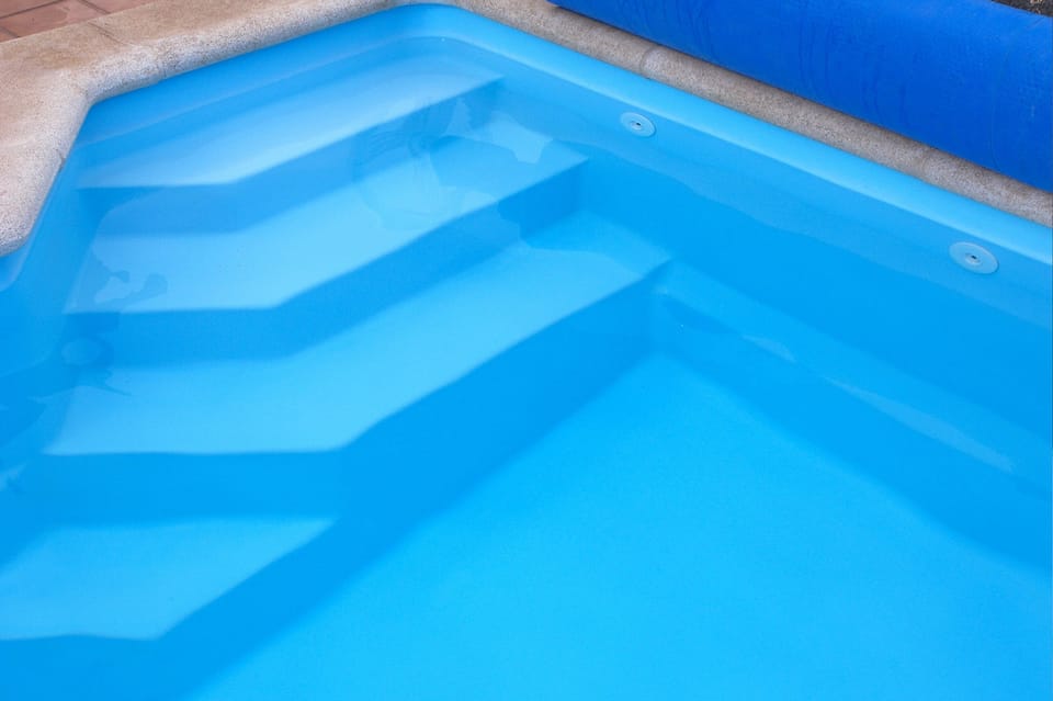 Sit in the pool with your favourite drink