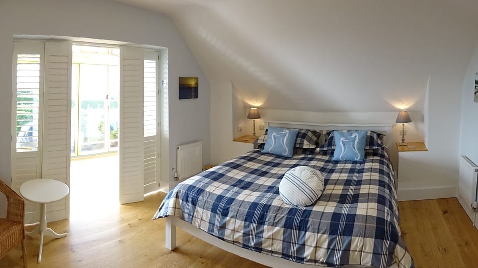 Master bedroom with sea views.