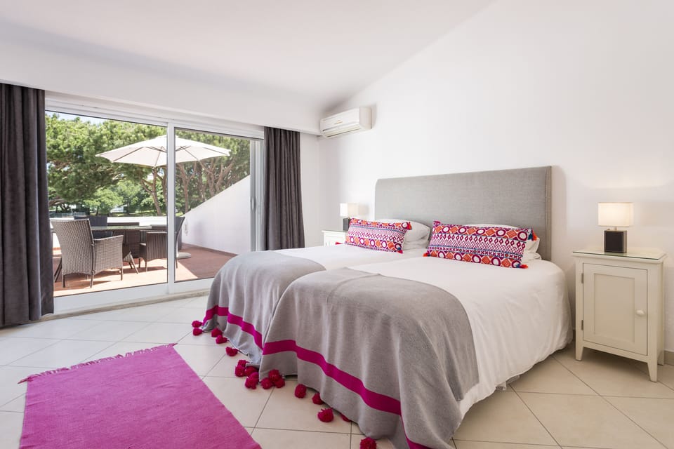 Master bedroom with private roof terrace and ensuite bathroom.