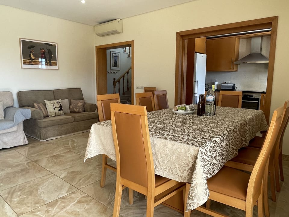 Air conditioning lounge/dinner, dinning table & 12 high back chairs. Vila hall entrance & fully fitted kitchen  The spacious lounge/dinning area also has individual sound system, 2 large sofas & 1 smaller sofa, 50" Smart TV, Satelite TV & DVD player.