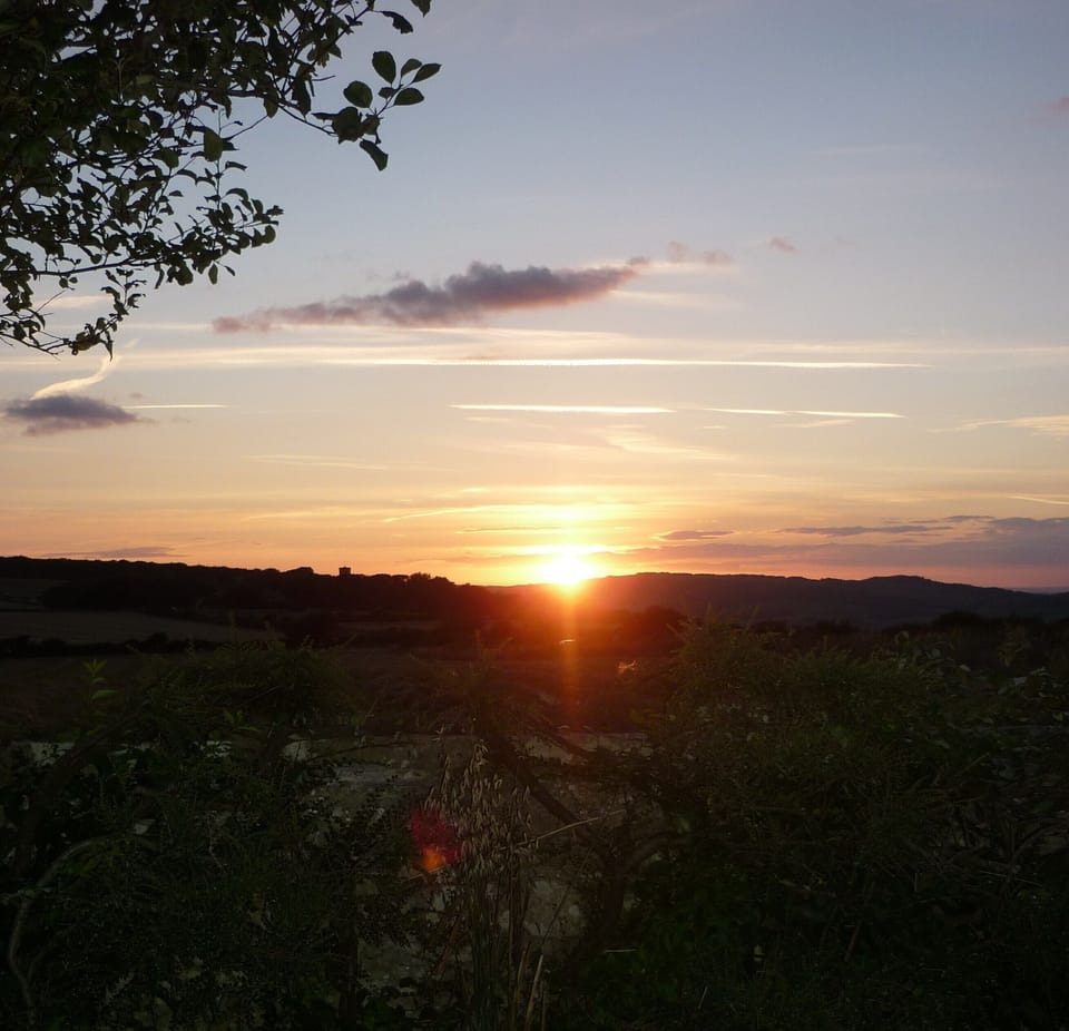 Sunset over the village of Kingston in the west.