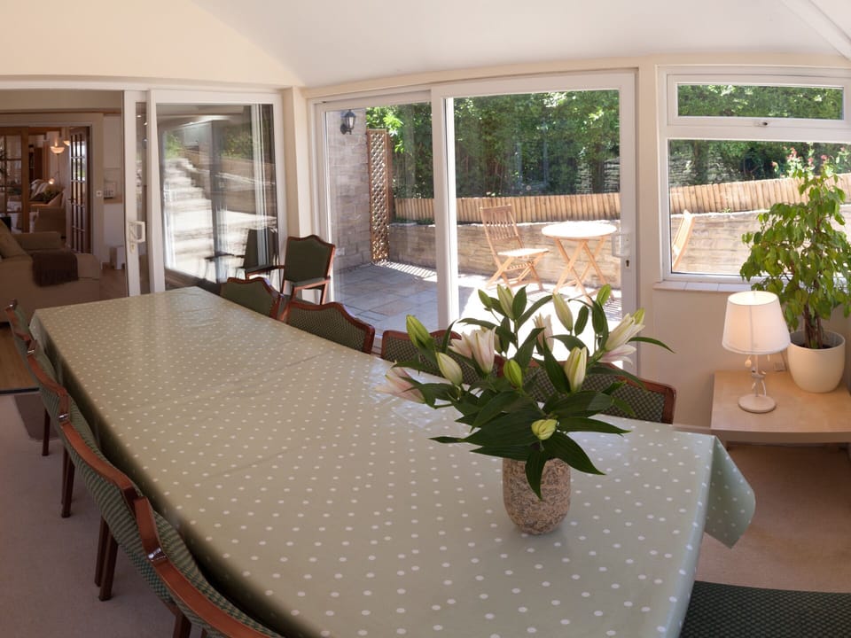 Conservatory Dining Room - patio doors to terrace & bistro seating for coffee