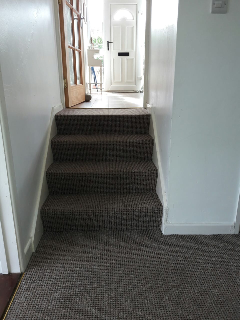 Ground Floor is split level by these 4 stairs 