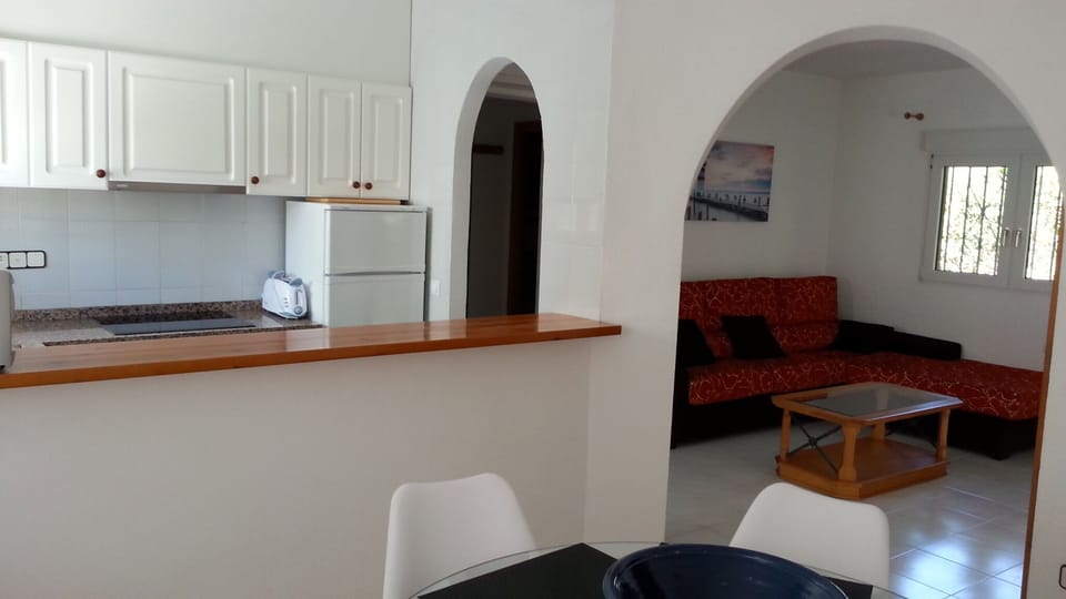 Dining area, kitchen and living area
