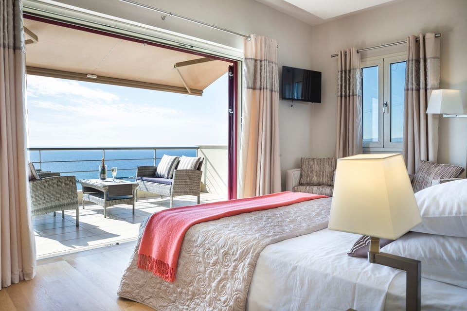 Master bedroom with large balcony and seaview