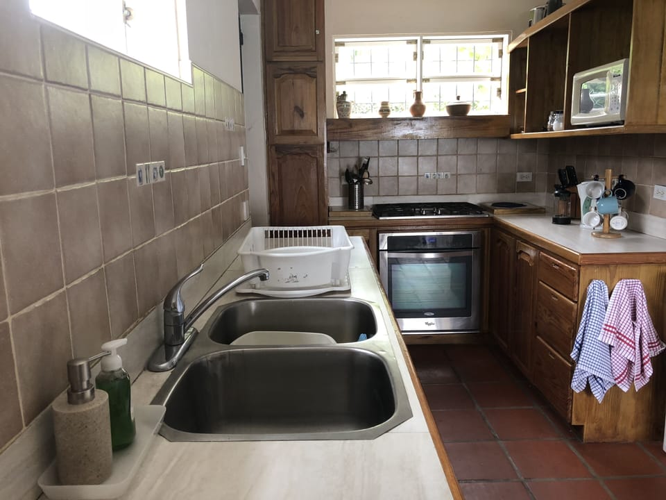 The well equipped kitchen at Little Reef lower apartment
