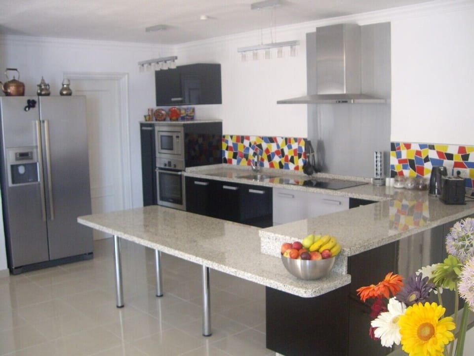 High Spec Fully Fitted Kitchen with Granite Work Surface, Mosaic Tiles, American Styled, Fridge Freezer & Dishwasher.