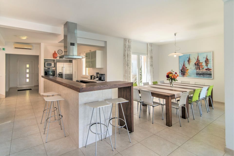 Open plan kitchen and indoor dining room
