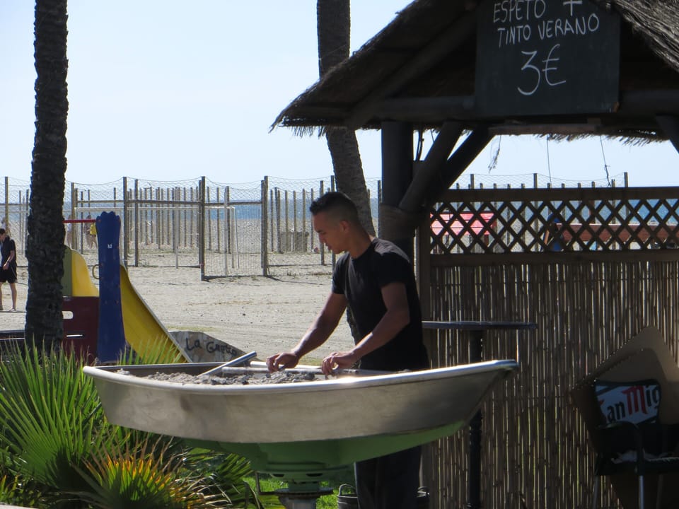Grilled sardines on the local beach