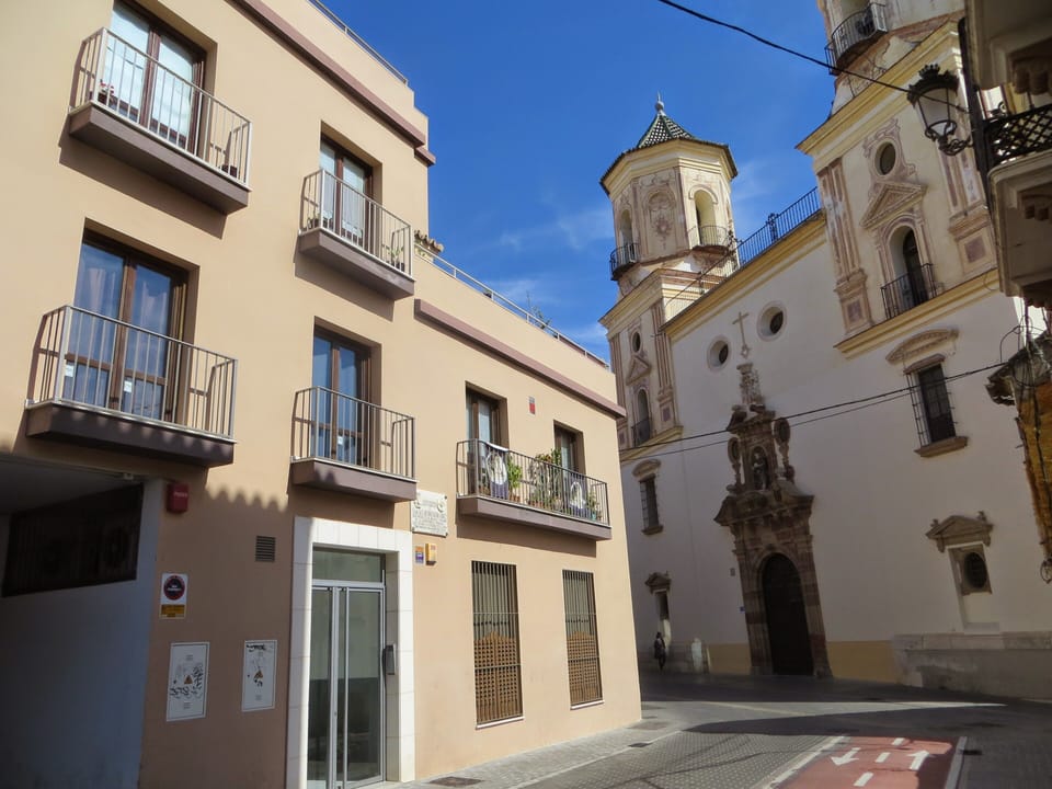 The apartment building next to the San Felipe Church