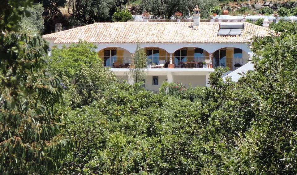The house captured from across the valley.