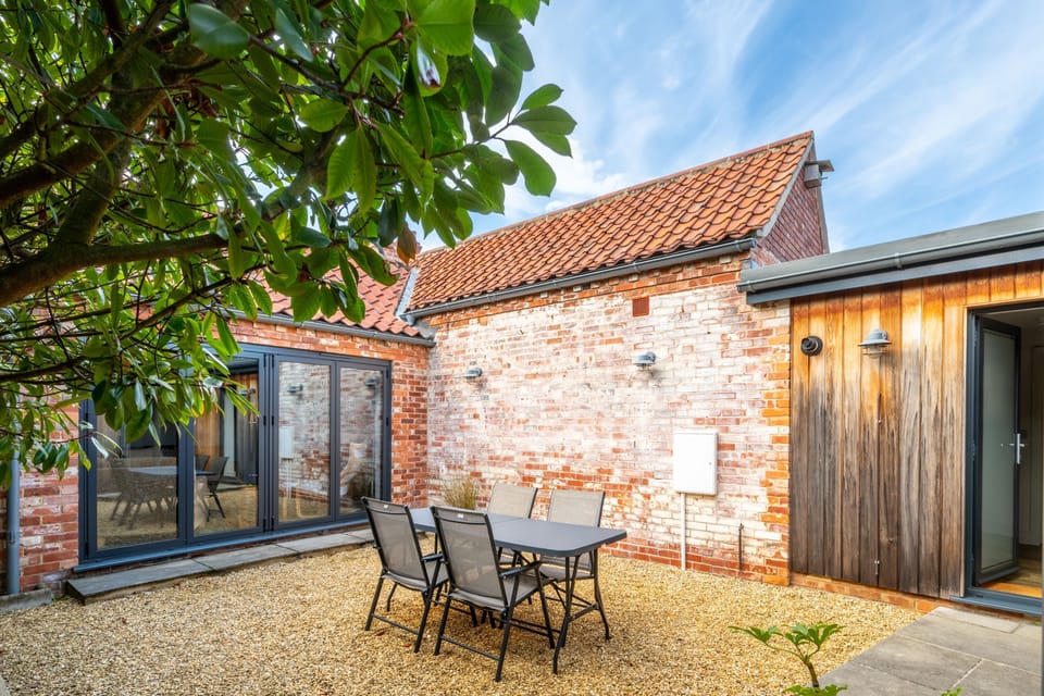 Dine al-fresco in the sheltered courtyard