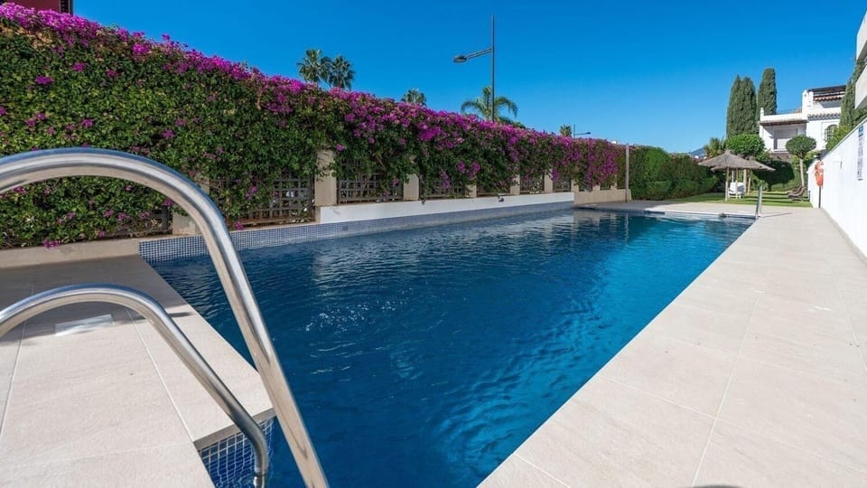 Sun drenched, private-feel pool. Set within an intimate garden space.