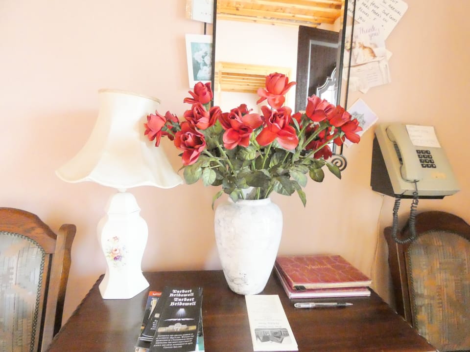 Front entrance hallway. visitors book. wifi details.