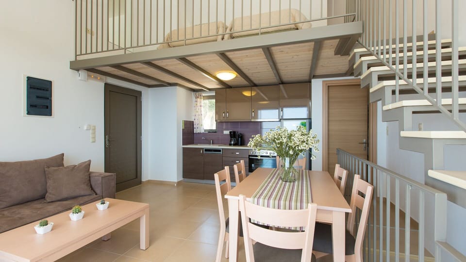 Indoor dining area a nd fully equipped kitchen