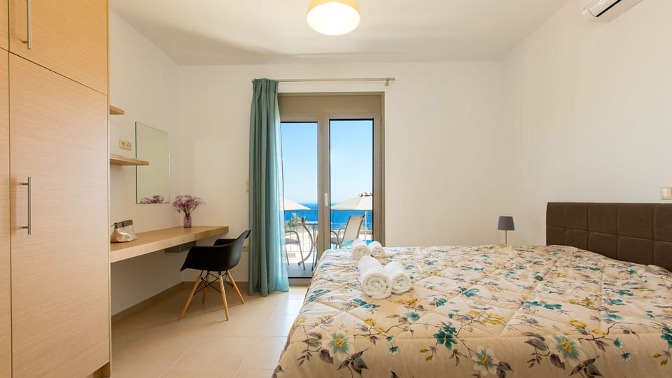 Bedroom on the ground floor with access to the pool area