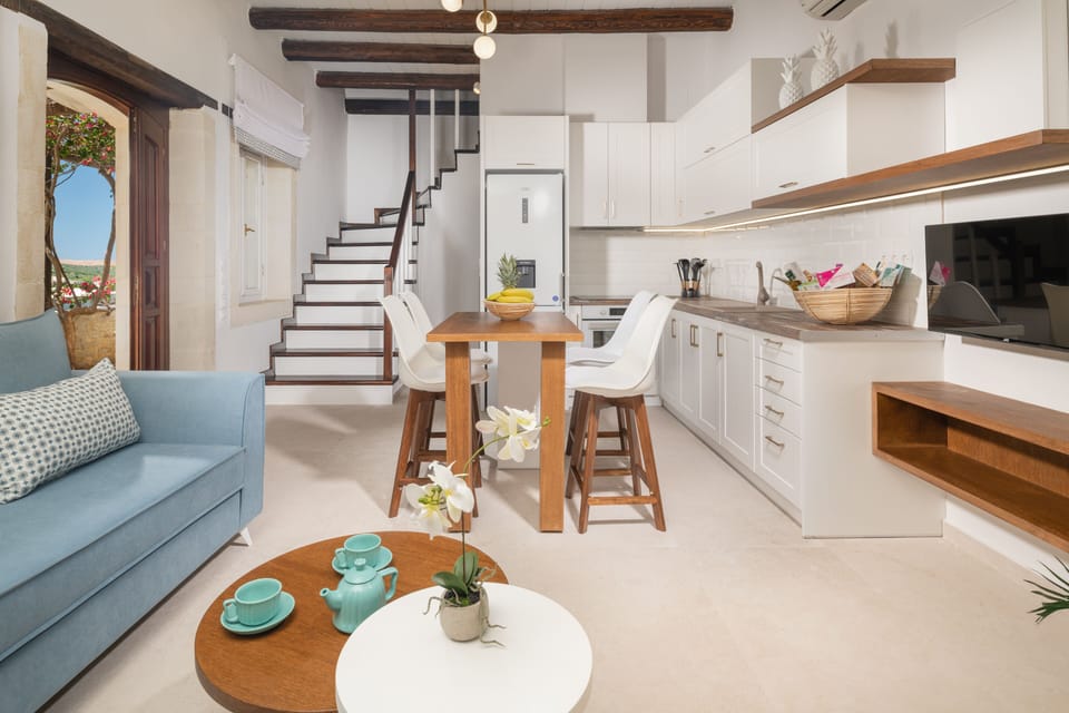 The living room & dining area opens to a balcony.