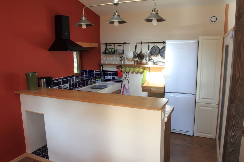 The kitchen is simple, but is ideal for a small family 