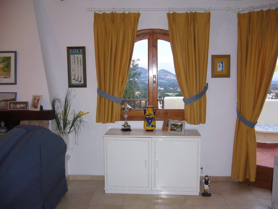 Lounge with double glazed patio doors to sunterrace