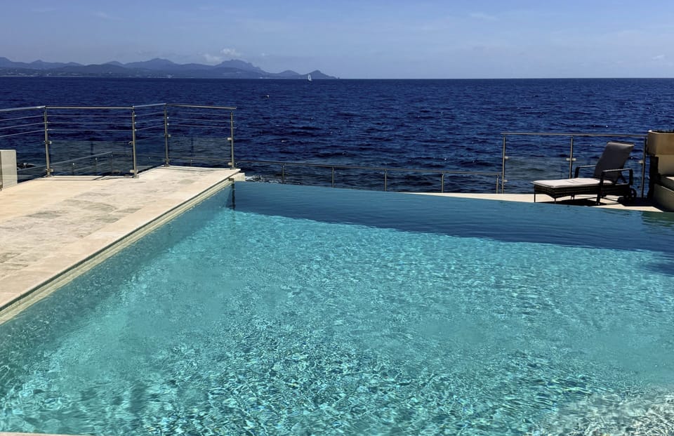 infinity pool directly in front of the Mediterranean Sea