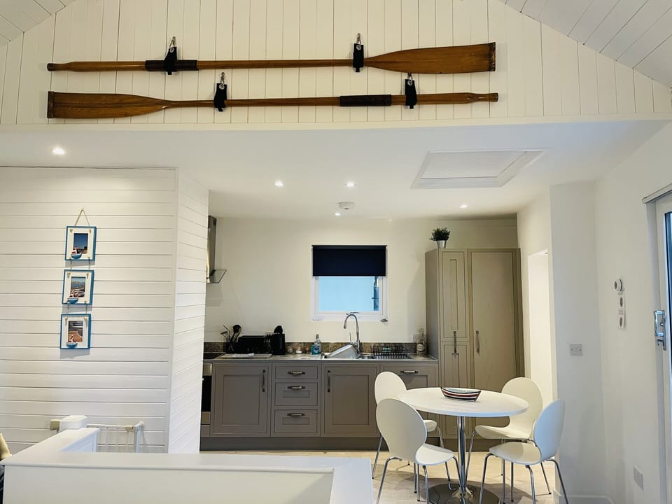 Climb the stairs to the open plan kitchen, dining and lounge