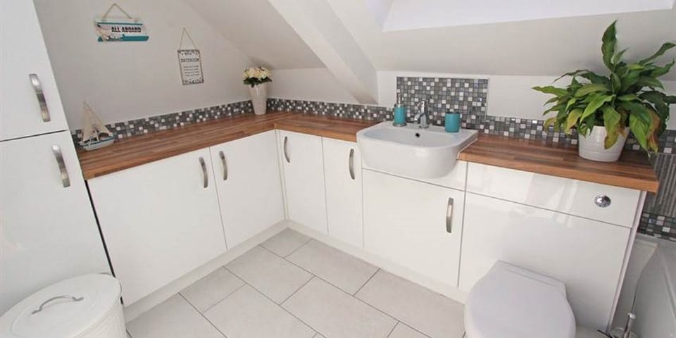 Bathroom 1 with bath and shower