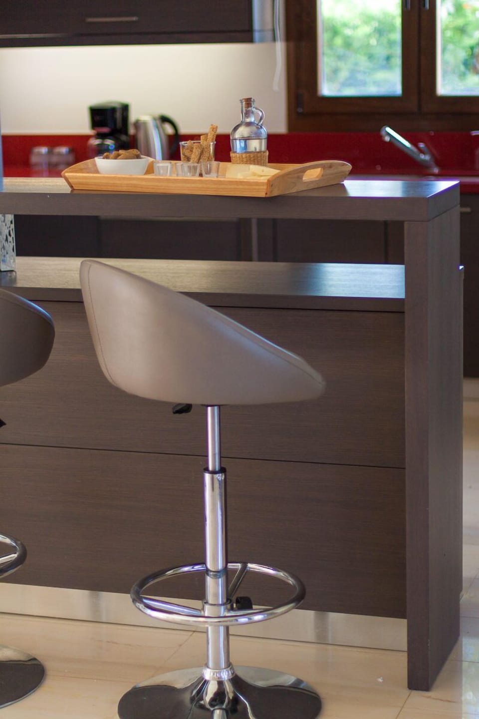 Modern kitchen counter with bar stools at the kitchen area!