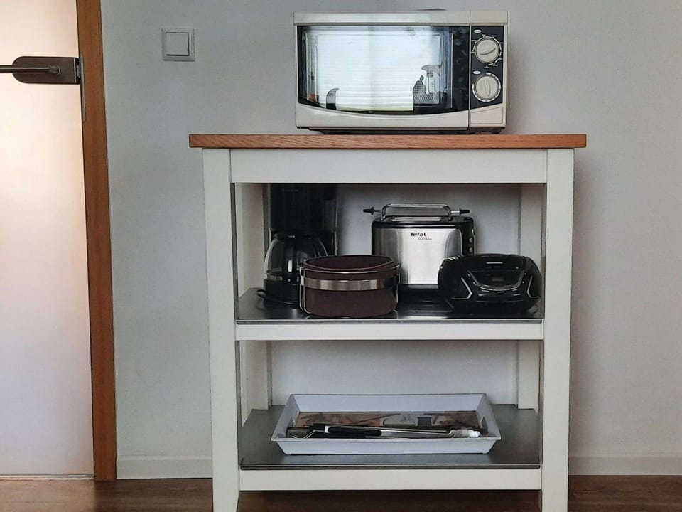 Microwave, toaster, egg stove