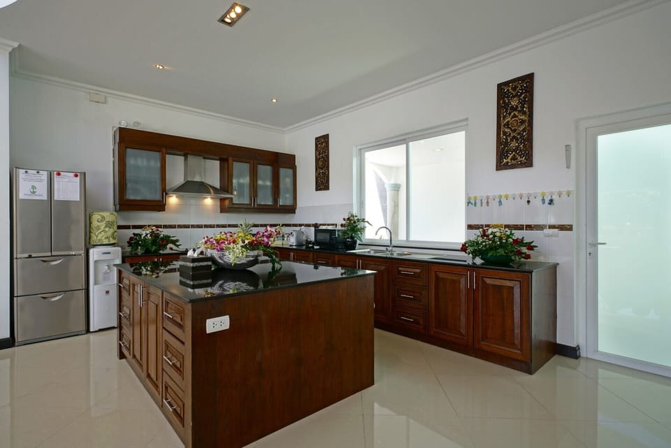 Fully equipped kitchen with complementary drinking water.