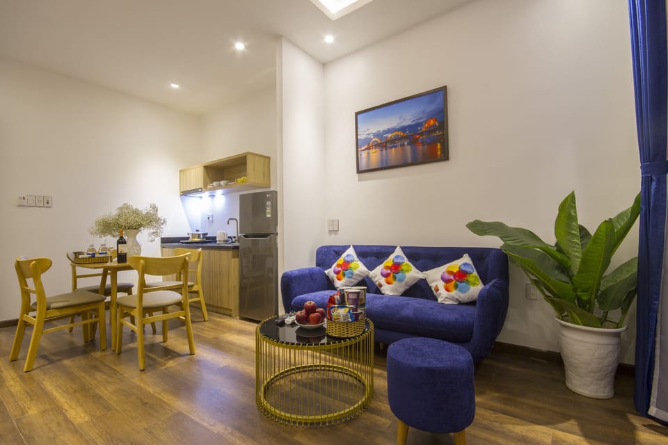 Family Apartment, 1 Bedroom, Balcony, City View | Living area | LCD TV, fireplace