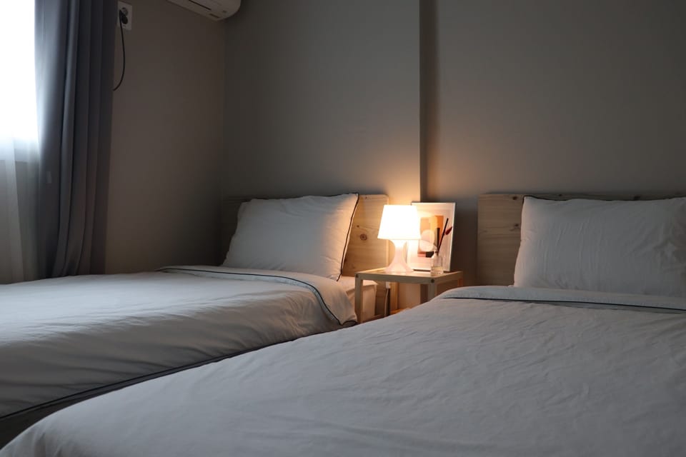 Basic Twin Room | 18 bedrooms, minibar, individually decorated, individually furnished