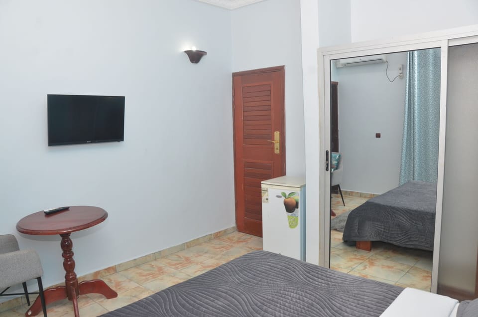 Deluxe Double Room, Non Smoking | Desk, blackout drapes, iron/ironing board, free WiFi