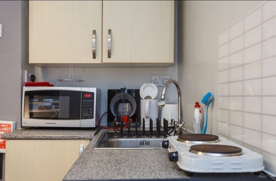 Apartment, 1 Double Bed, Non Smoking, Ground Floor | Private kitchen | Fridge, microwave, coffee/tea maker, electric kettle