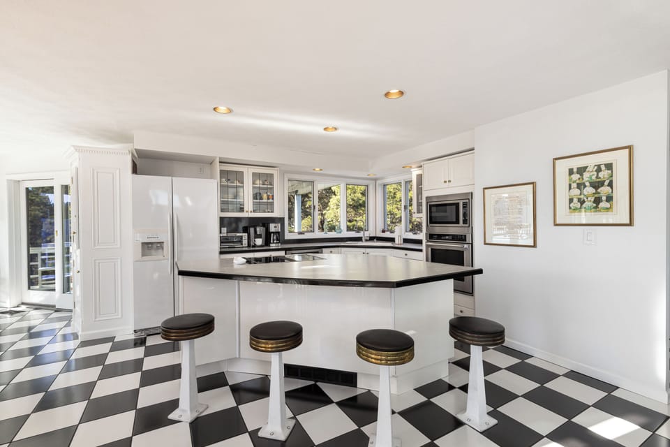 Second floor: kitchen with open floor plan - seated island for 4