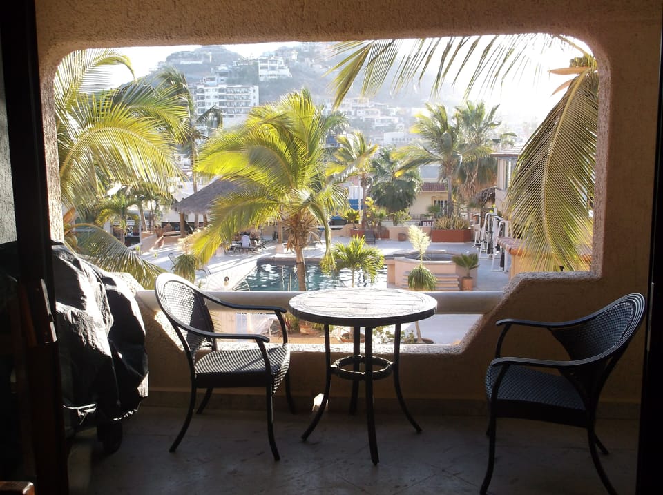 Terrace off living room featurs pool & mountains views!(spa has been removed)