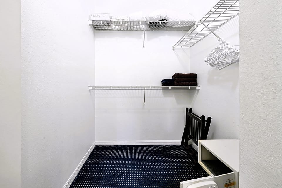 Large Walk-in Closet for Primary bedroom.  Hotel-style Safe