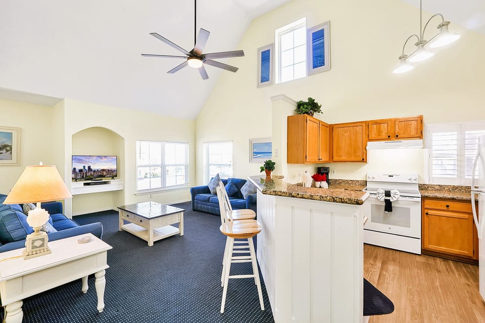 Cathedral ceilings. Breakfast bar. New! 65" Roku TV has been added in corner.
